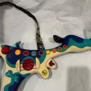B. Woofer Hound Dog Guitar by B. toys